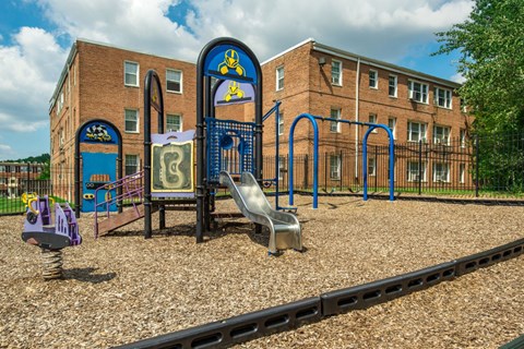 playground with jungle gym at jetu apartments in washington dc