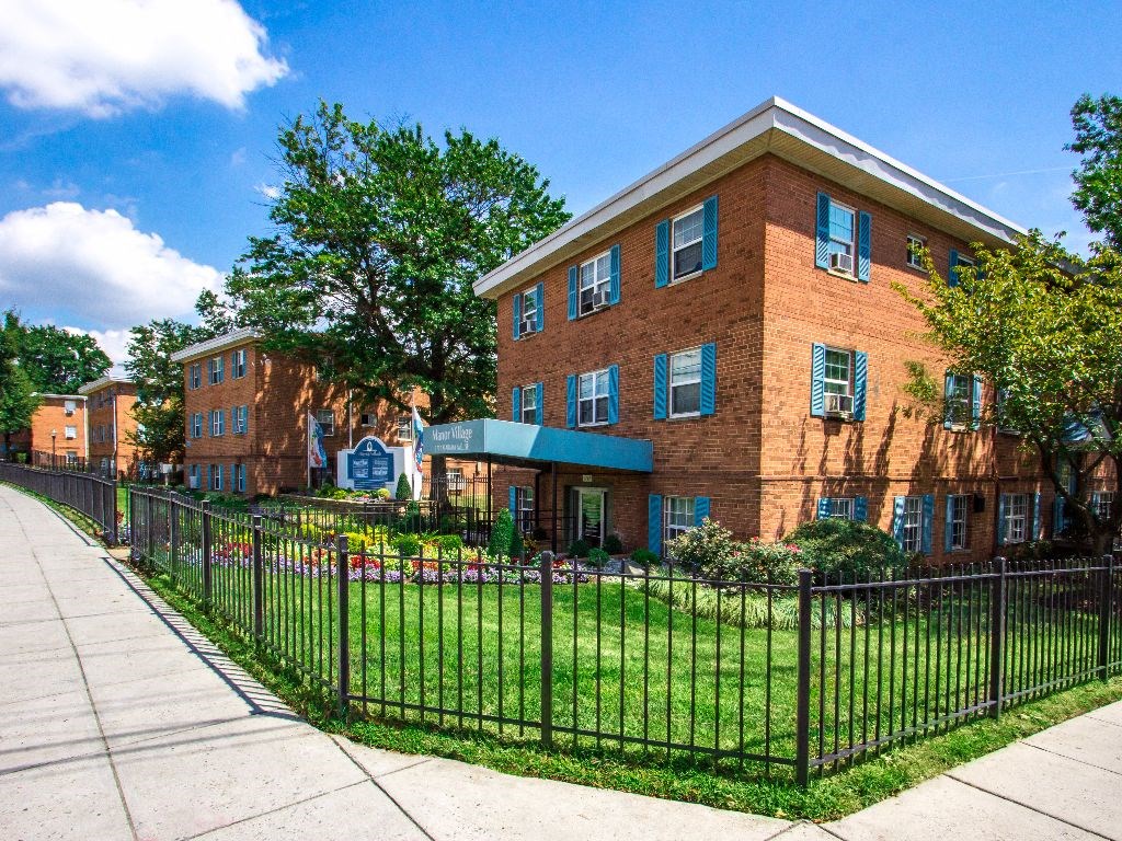 exterior brick view of manor village  tax credit apartments in washington dc