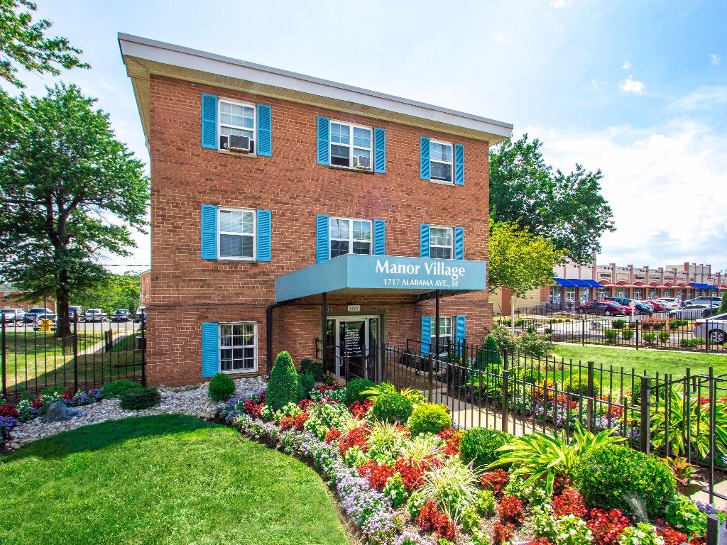 exterior brick view of manor village  tax credit apartments in washington dc