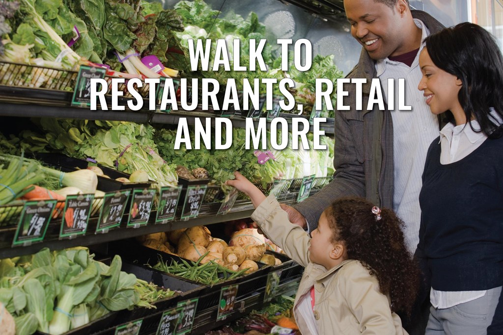 A family is shopping for vegetables in a grocery store.