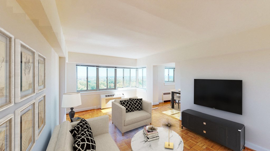 living area with sofa, coffee table, hardwood floors, credenza with tv, and large windows at sherry hall apartments in washington dc