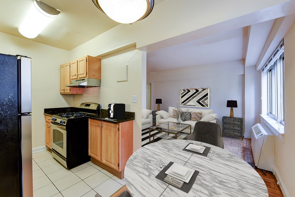 kitchen with wood cabinetry, gas range, stainless steel appliances, and view of living area at sherry hall apartments in washington dc