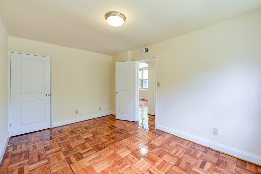 living area with wood flooring at shipley park apartments in shipley terrace washington dc