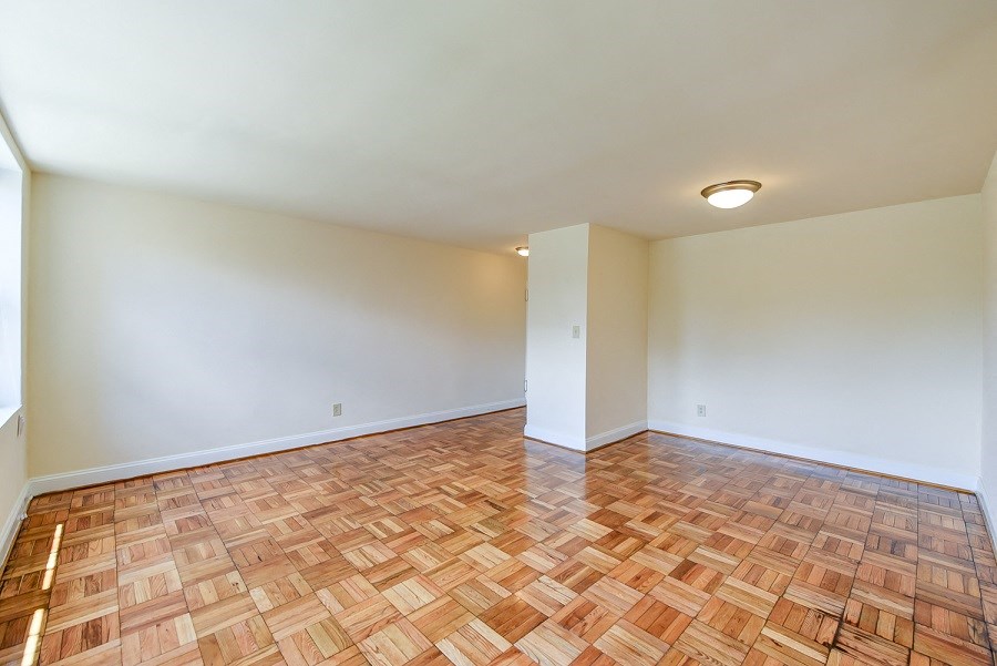 living area with wood flooring at shipley park apartments in shipley terrace washington dc