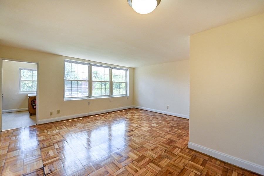 living area with wood flooring at shipley park apartments in shipley terrace washington dc
