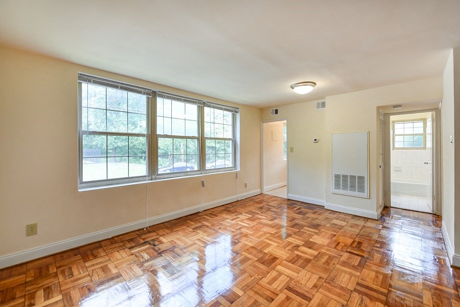 living area with wood flooring at shipley park apartments in shipley terrace washington dc