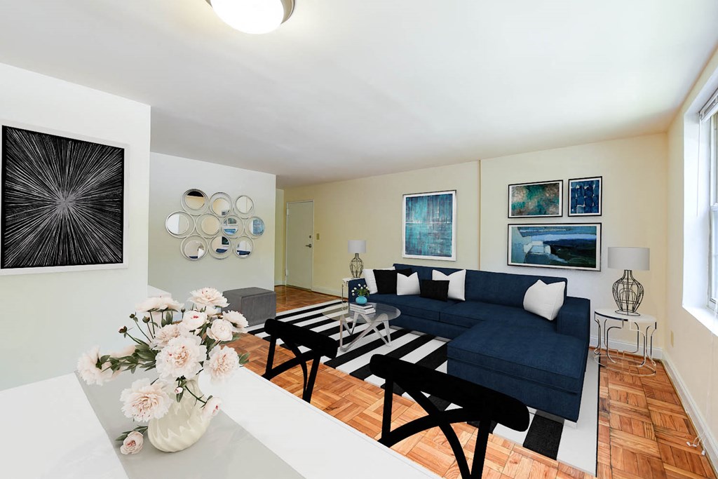 dining area with table, chairs, hardwood flooring and view of living area at shipley park apartments in washington dc