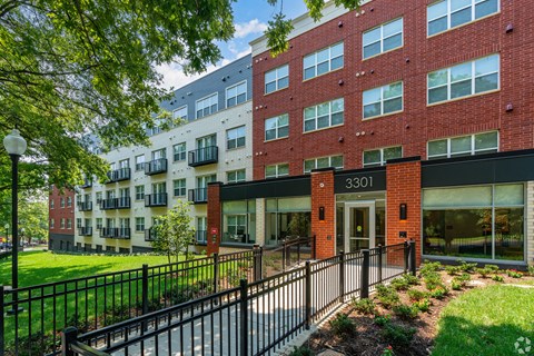 A red brick building with the number 3301 on it.
