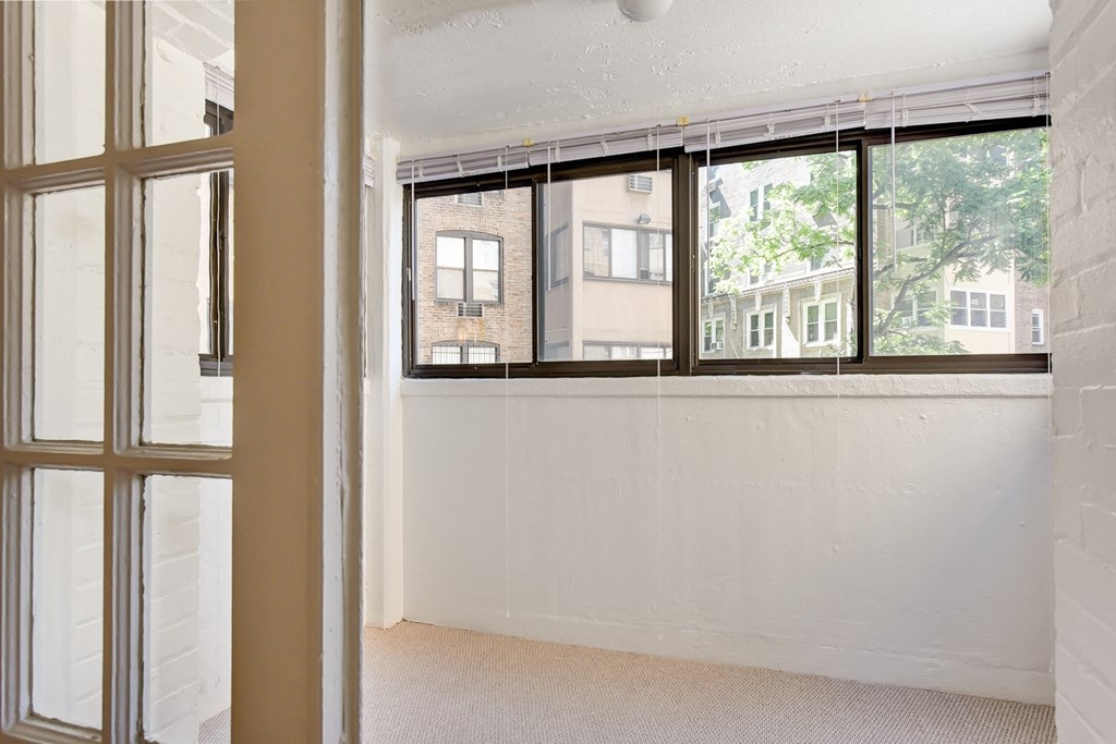 enclosed porch at the shawmut apartments in adams morgan washington dc
