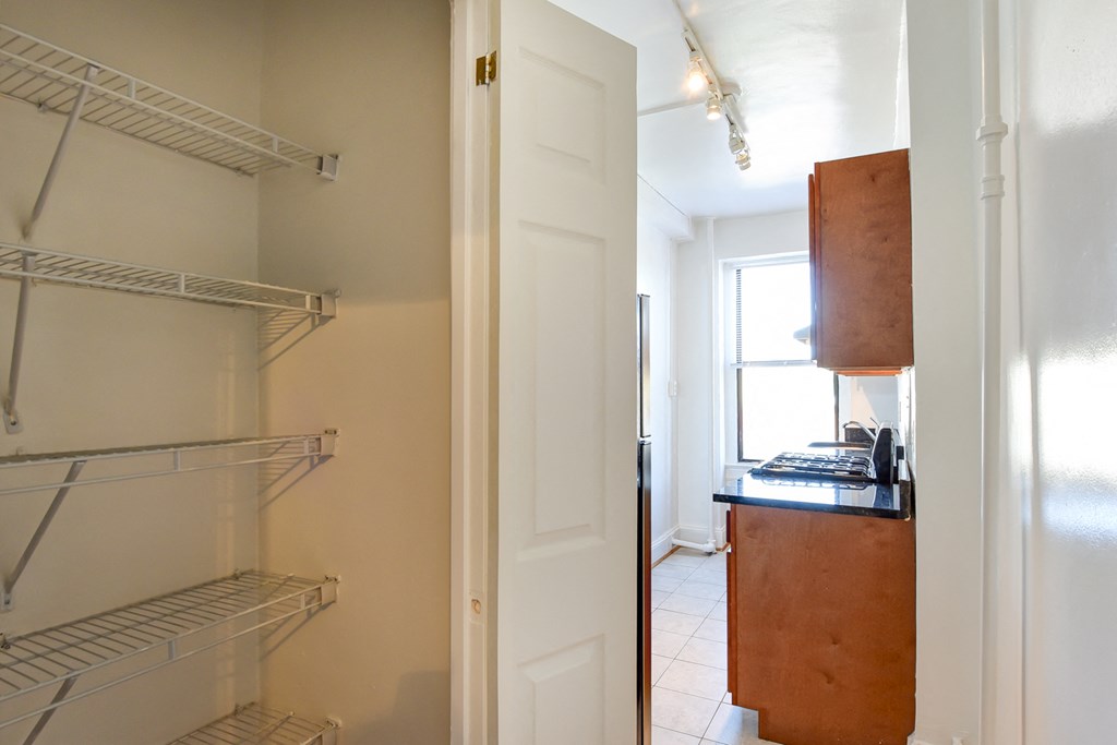 view of pantry with shelving at the shawmut apartments in adams morgan washington dc