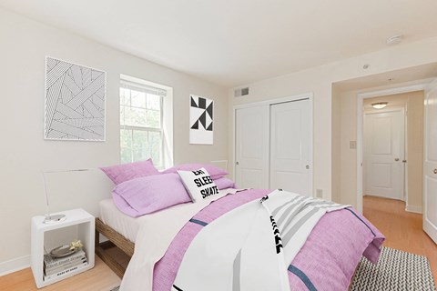 bedroom with hardwood flooring at the oaks apartments in washington dc