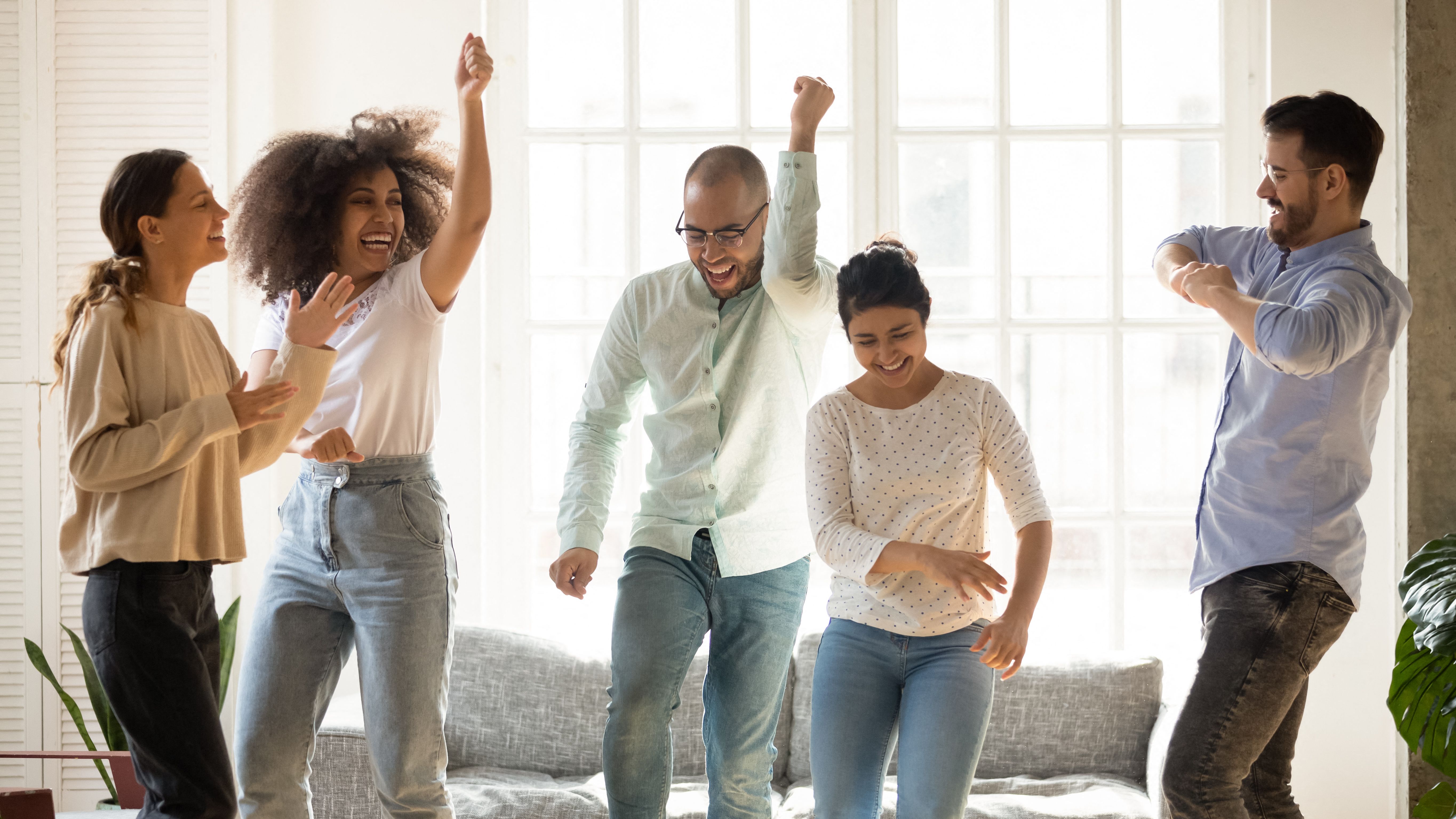 Friends hanging out in apartment