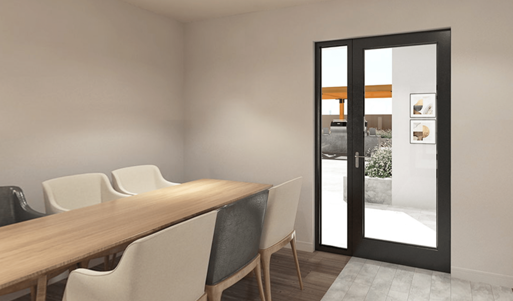 conference table with chairs and glass entrance door at the strand apartments in hillbrook deanwood washington dc