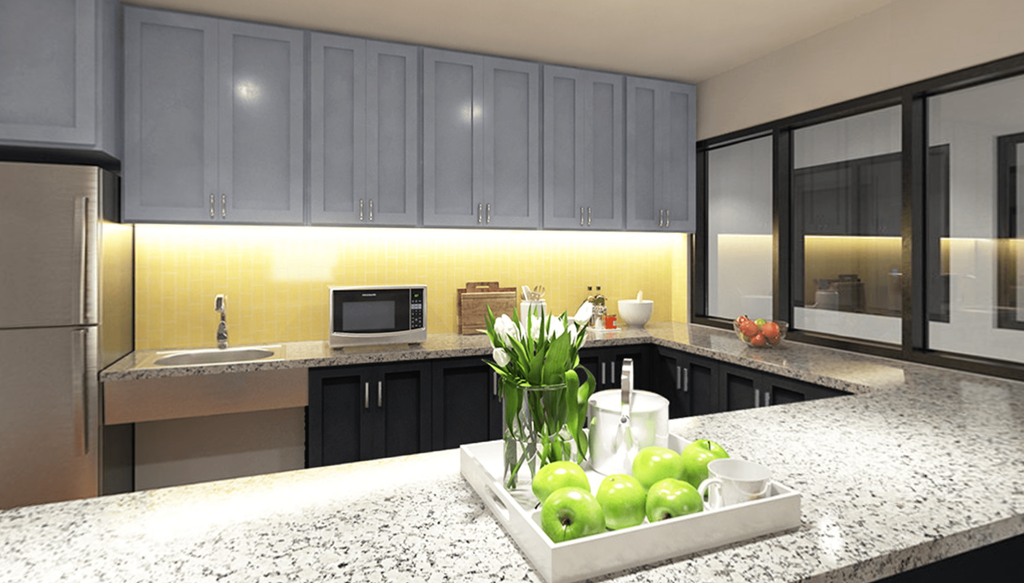 kitchen with modern cabinets and large bar in cyber cafe at the strand apartments in hillbrook deanwood washington dc