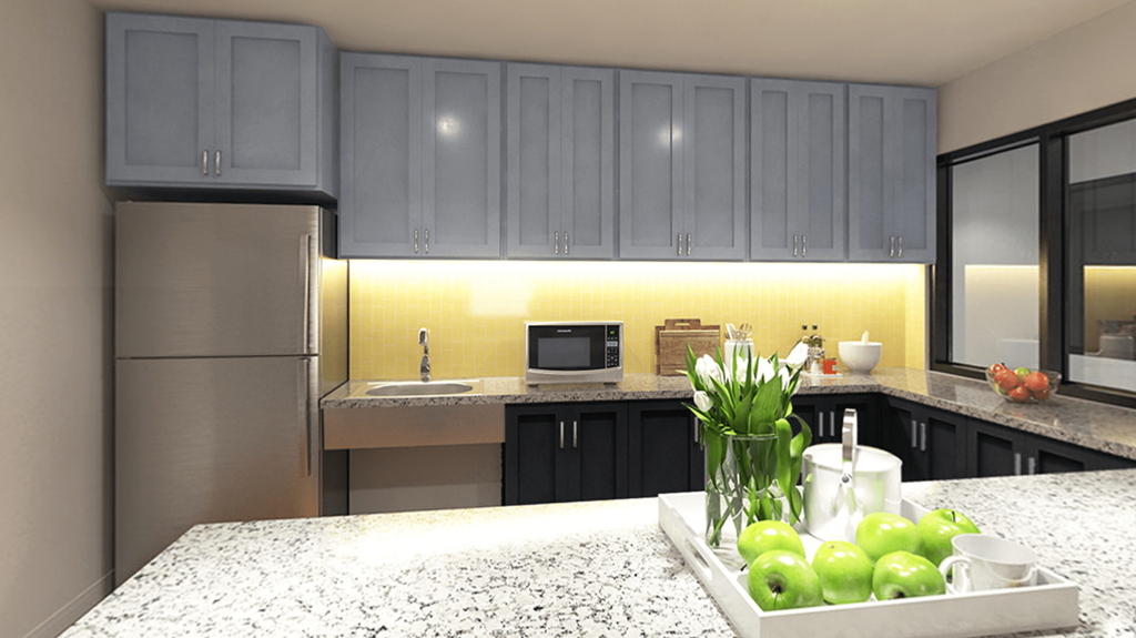 kitchen with modern cabinets and large bar in cyber cafe at the strand apartments in hillbrook deanwood washington dc