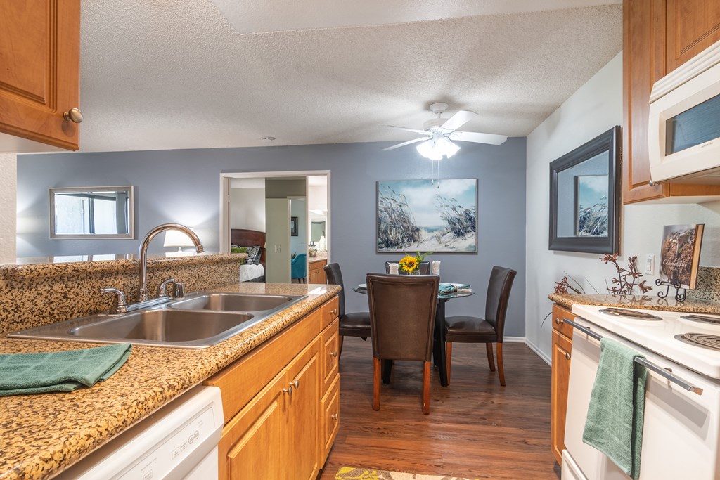 the kitchen and dining room are open to the living room