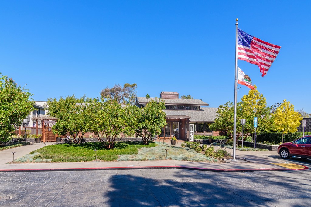 A building with a flag on top of it.