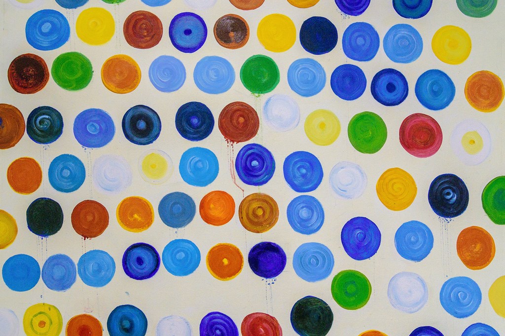 A painting of many circles in various colors.