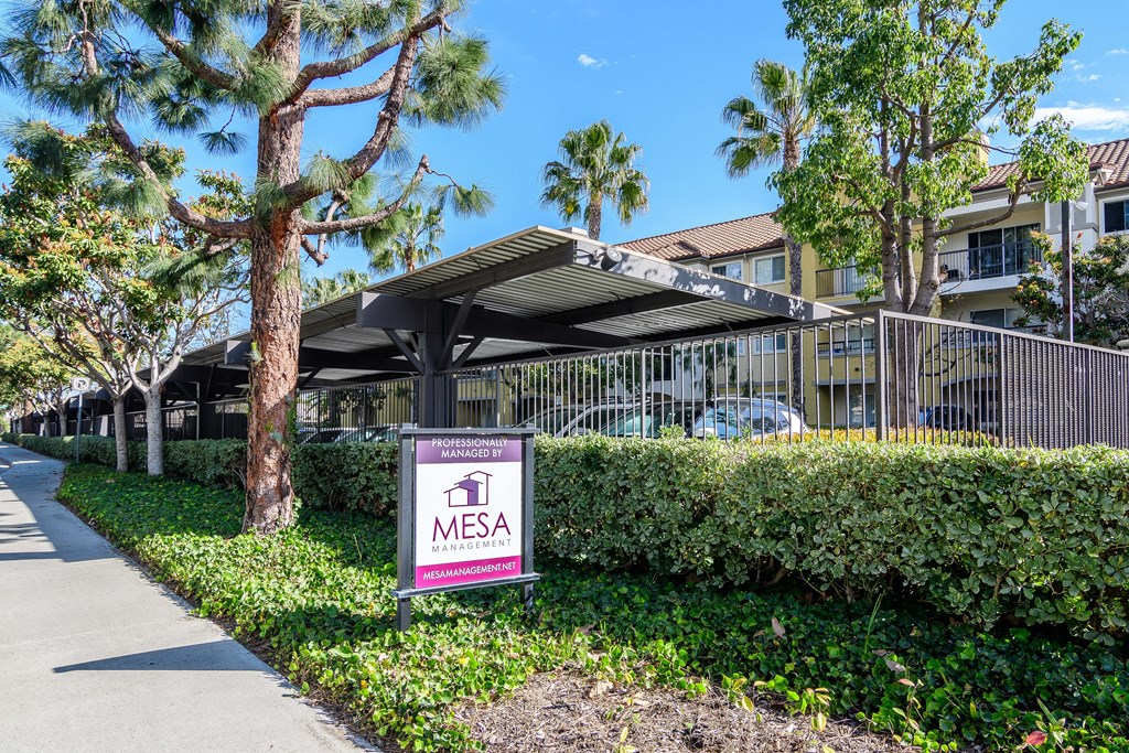 A Mesa sign is in front of a building.