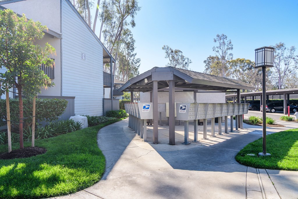 A building with a mailbox in front of it.
