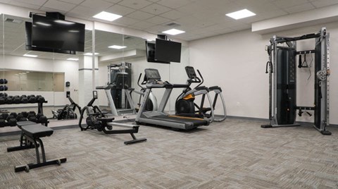 Fitness Center w/ Peloton Bikes at 405 W Redwood Apartments, Maryland, 21201