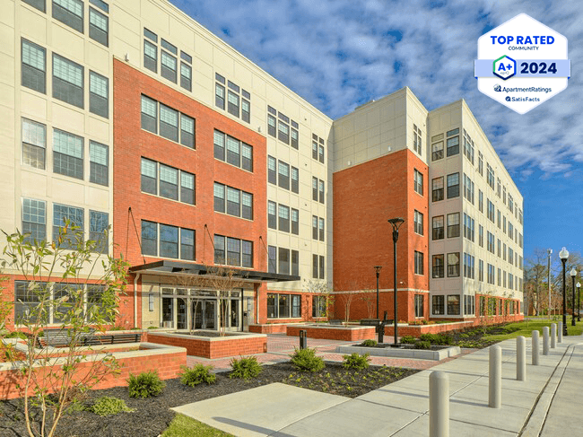 Ingram Manor Apartments Encore  Exterior Daylight Image with Top Rated Community Logo