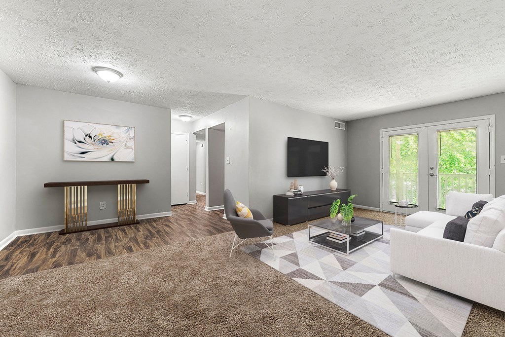 Living Room With TV at Bradford Gwinnett Apartments and Townhomes, Norcross