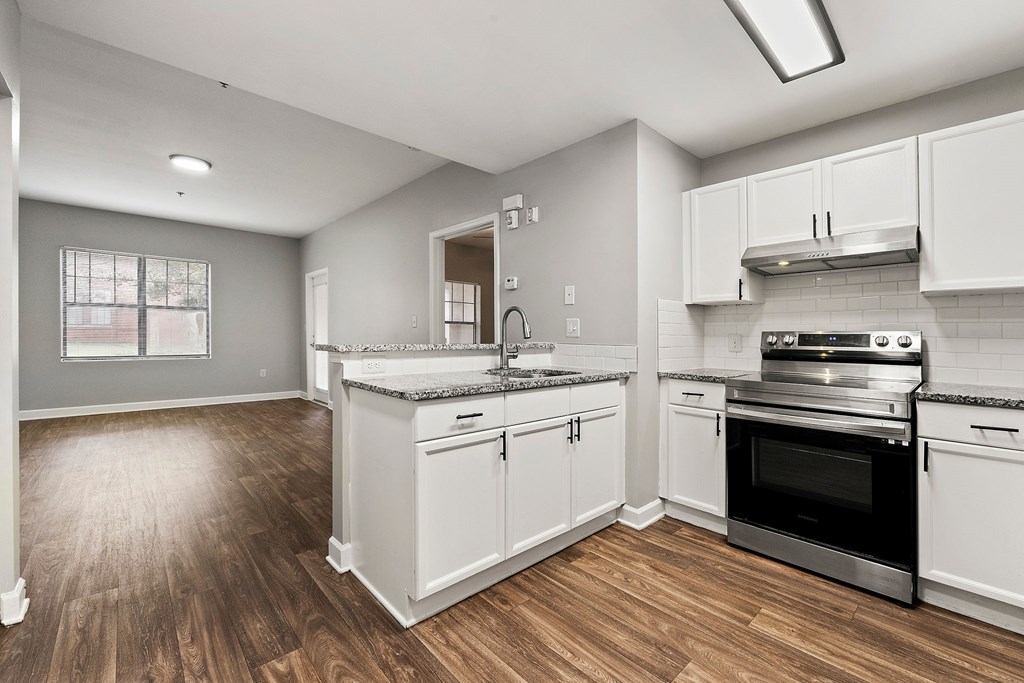 Upgraded kitchen with stainless steel appliances Upgraded kitchen with stainless steel appliances at Crogman School Lofts, Atlanta GA 30315