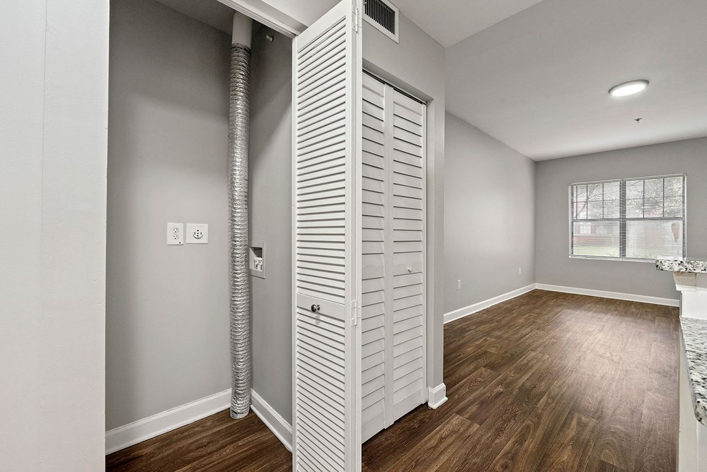 A room with a white door and a window. at Crogman School Lofts, Atlanta GA