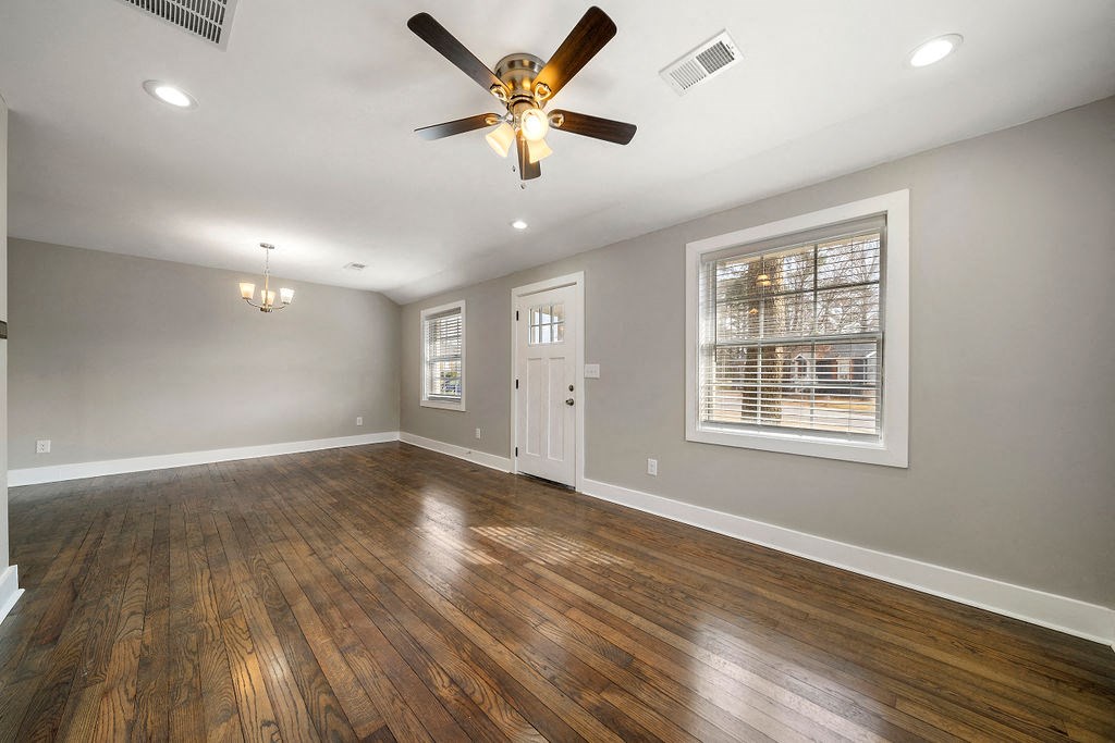 Living room with ceiling fan at Balfour Marietta Apartments, Marietta, GA, 30060