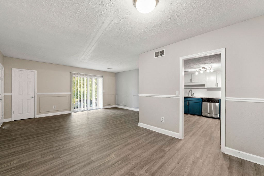 Ultra Spacious Living Room New Flooring Throughout at Pines at Lawrenceville Decatur 30033