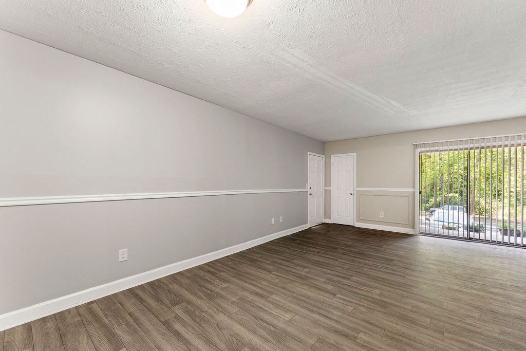 Ultra Spacious Living Room New Flooring Throughout at Pines at Lawrenceville Decatur 30033