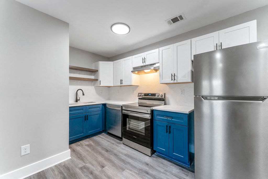 Stainless Steel Appliances Quartz Countertops Stylish Cabinetry at Woodbriar Management, LLC, Tucker, GA, 30084