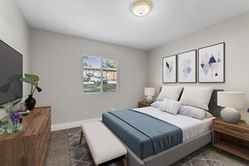 Spacious bedroom with plush carpet at Ridgewood Apartments, Lawrenceville, GA 30045