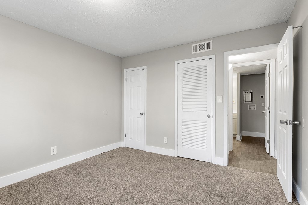 Carpeted Bedroom at Ridgewood Apartments, Lawrenceville, GA