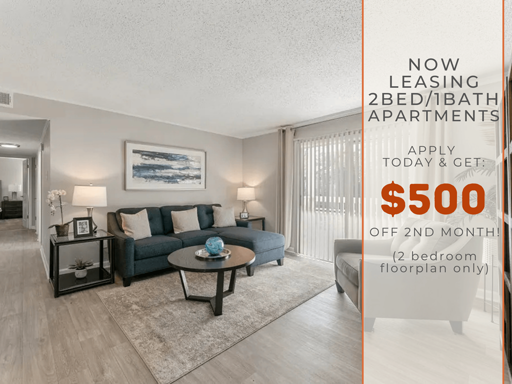 A living room with a sofa, two chairs, and a coffee table is on sale for $500 off the second month.