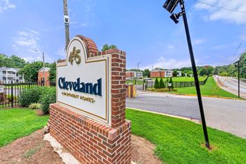 a brick monument with a sign that reads at 445 Cleveland, Atlanta Georgia