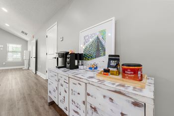 the living room has a counter with coffee supplies and a painting on the wall at 445 Cleveland, Georgia, 30354