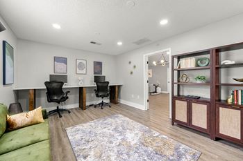 a living room with a couch and a desk at 445 Cleveland, Atlanta