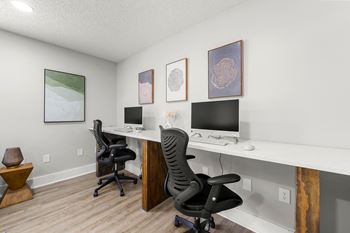 a home office with two desks and two computer monitors at 445 Cleveland, Atlanta Georgia