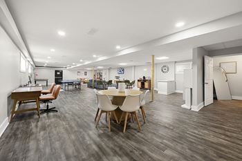 Clubroom with ample seating at Gardens at Washington Park, Atlanta, GA