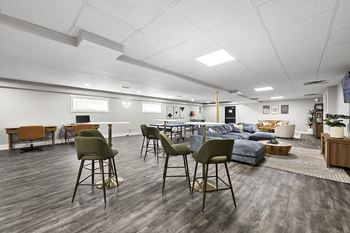 Clubhouse with hightop seating and chairs at Gardens at Washington Park, Atlanta, GA, 30314
