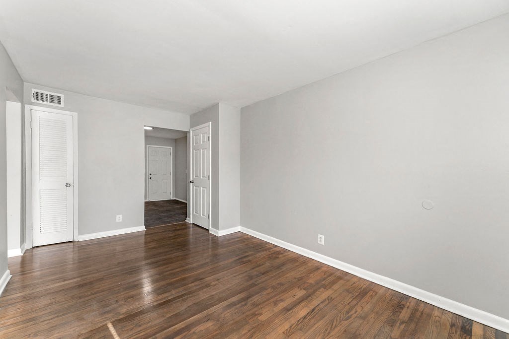 Living Room New Flooring Throughout at Gardens at Washington Park 1, Atlanta, GA, 30314