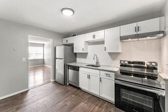 Stainless Steel Appliances Granite Countertops Soft-Close Cabinetry Upgraded Kitchen