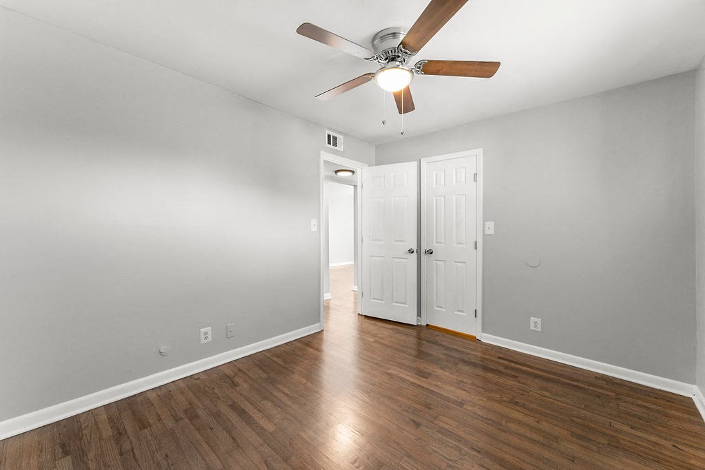 Bedroom Ceiling Fan New Flooring Throughout at Gardens at Washington Park 1, Atlanta, 30314