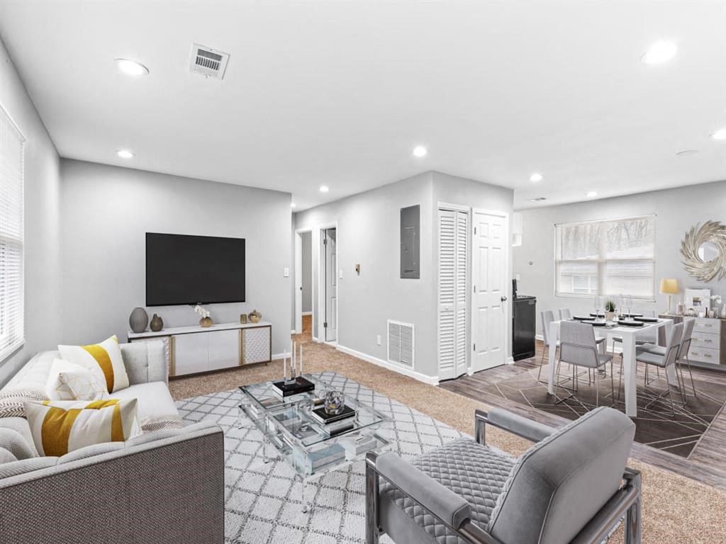 a living room with a couch and a television