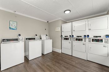 our laundry room is equipped with washers and dryers and has a row of at 445 Cleveland, Atlanta, GA