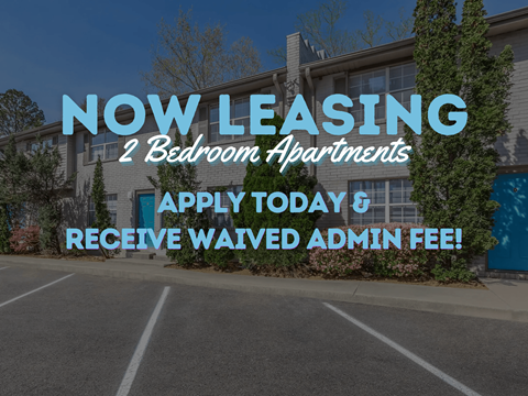 A sign advertising 2 bedroom apartments for lease with a waived admin fee.
