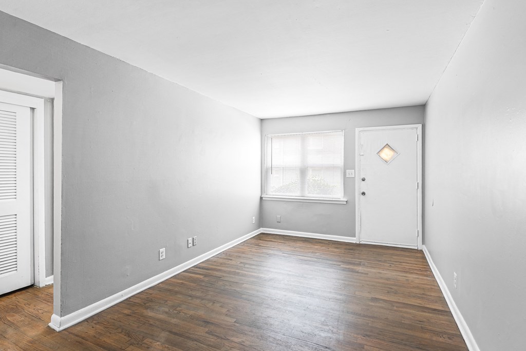 Spacious Living Room Hardwood Floors at Gardens at Washington Park 1, Atlanta, GA