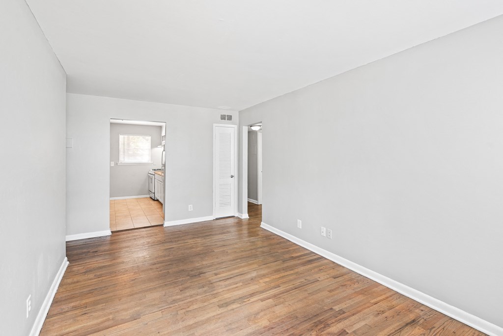 Spacious Living Room Hardwood Floors at Gardens at Washington Park 1, Georgia, 30314